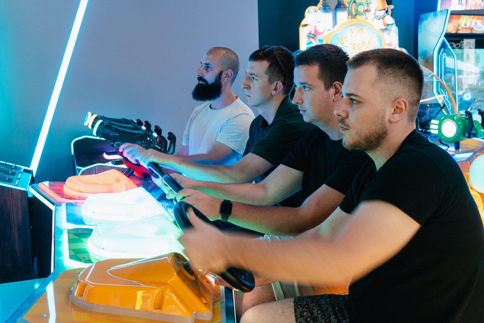 OOX mobile game development team playing arcade games during a mid-year reset